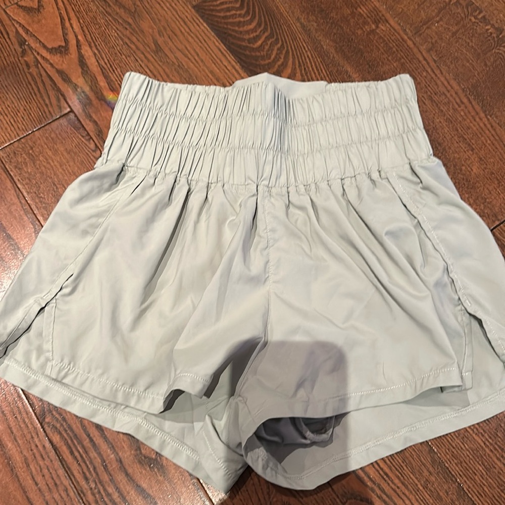 xs green shorts , wide waist bandlined and have a nice flare at bottom